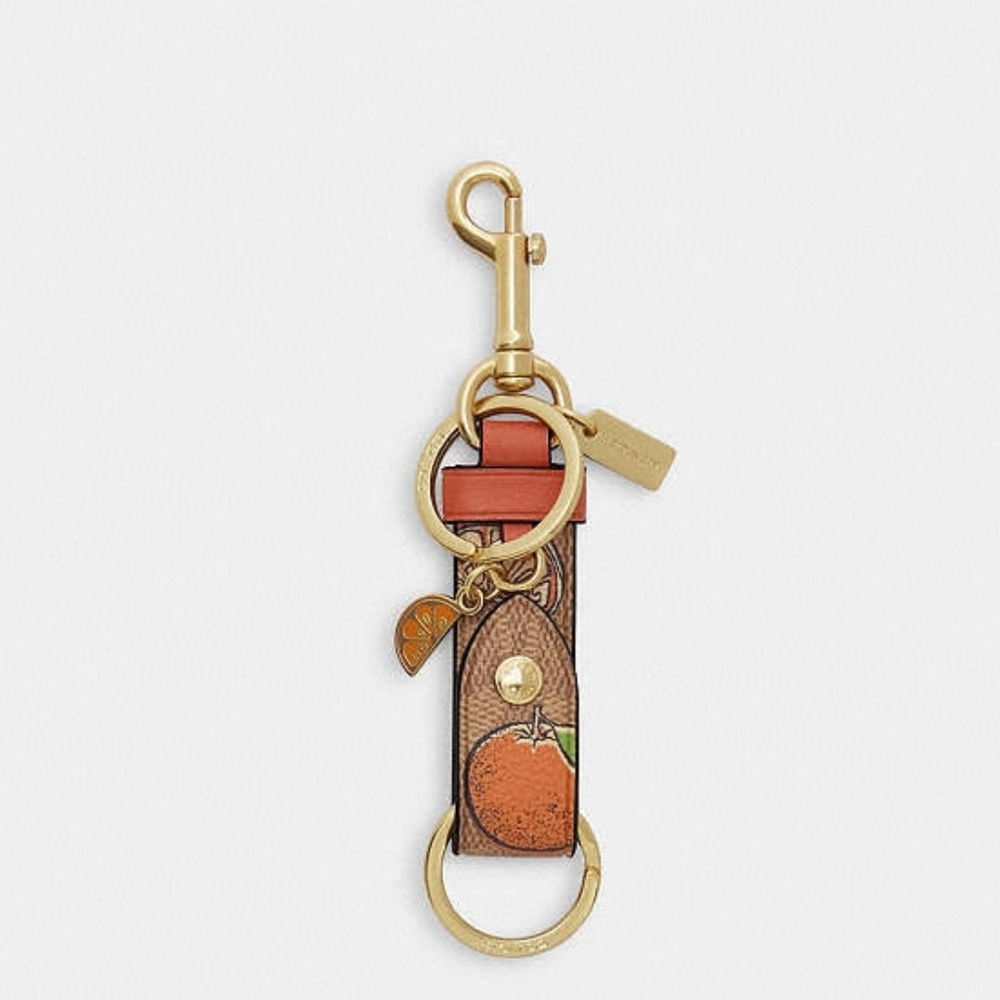 Coach Trigger Snap Bag Charm In Signature Canvas With Orange Print NWT - Picture 3 of 3